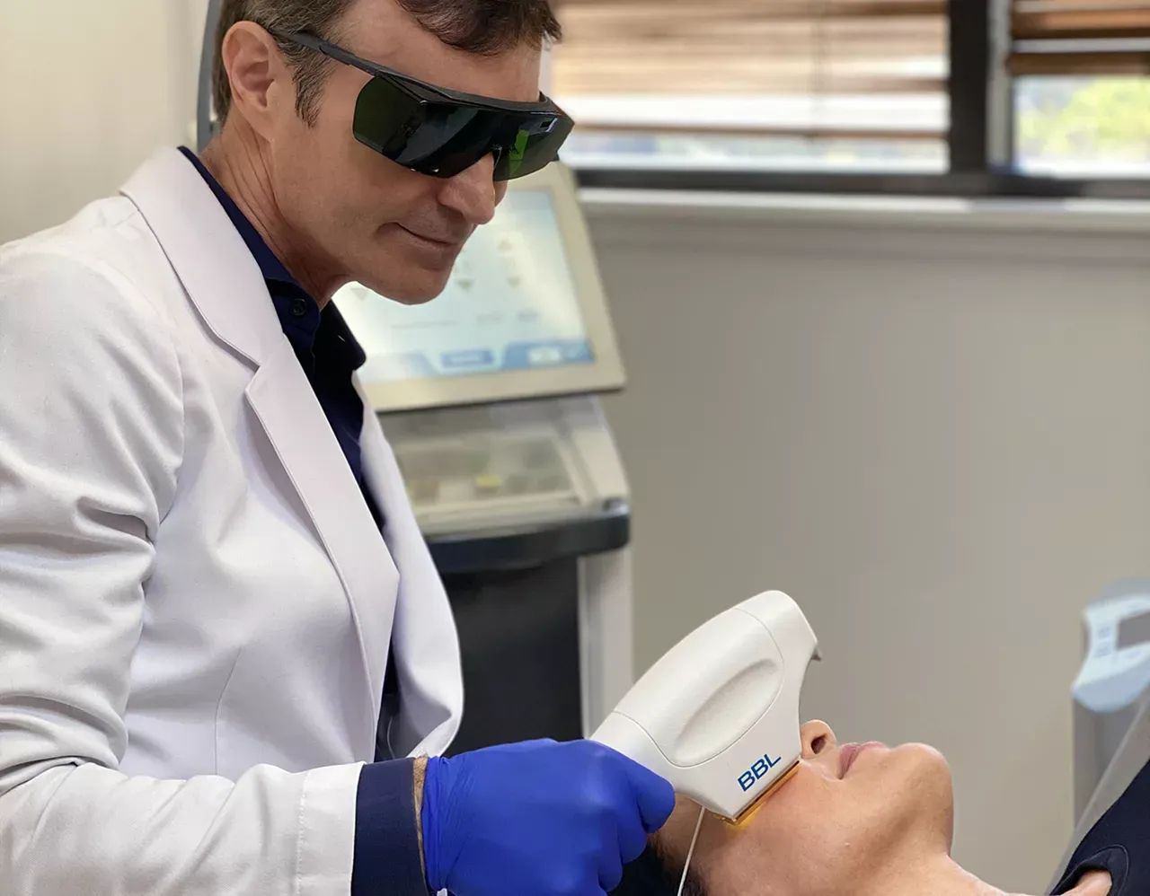 Laser treatment in a medical aesthetic setting.