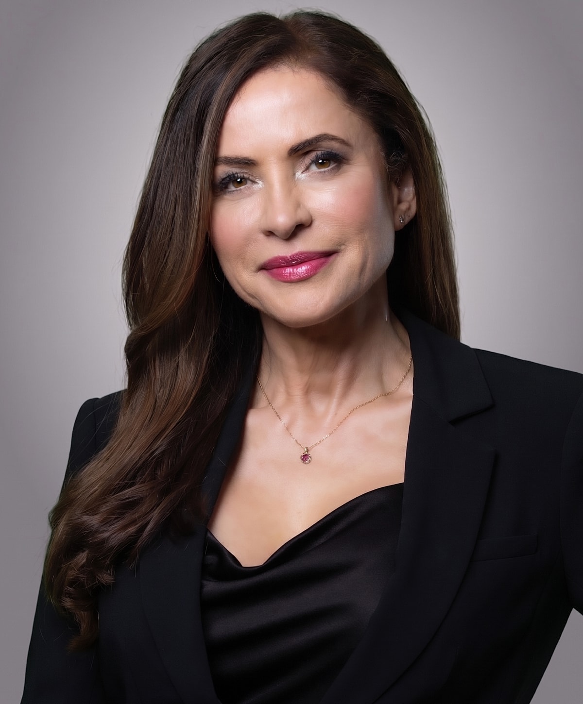 Professional portrait of a confident woman.