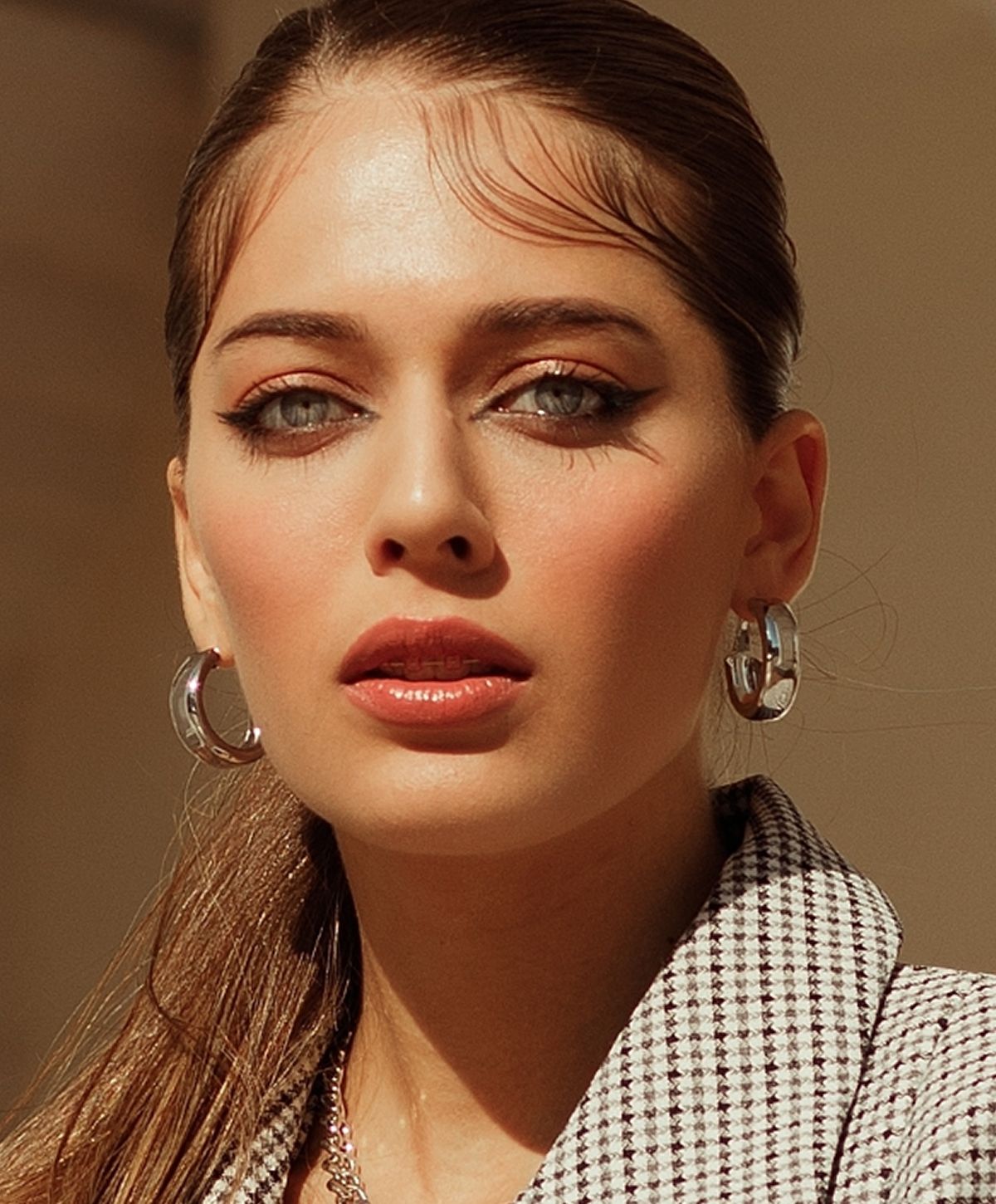 Portrait of a woman with striking makeup.