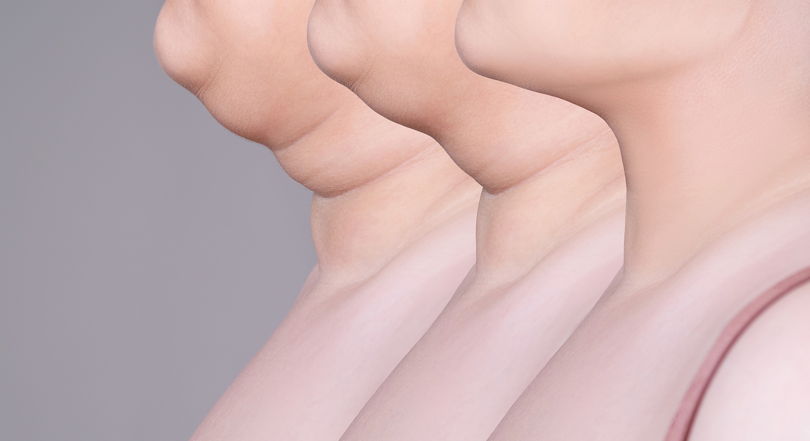 Three neck profiles with varying skin tones.