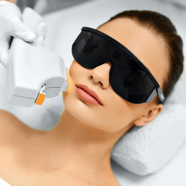 Skin Care. Young Woman Receiving Facial Beauty Treatment, Removing Pigmentation At Cosmetic Clinic. Intense Pulsed Light Therapy. IPL. Rejuvenation, Photo Facial Therapy. Anti-aging Procedures. | Patrick Bitter MD in Los Gatos, CA